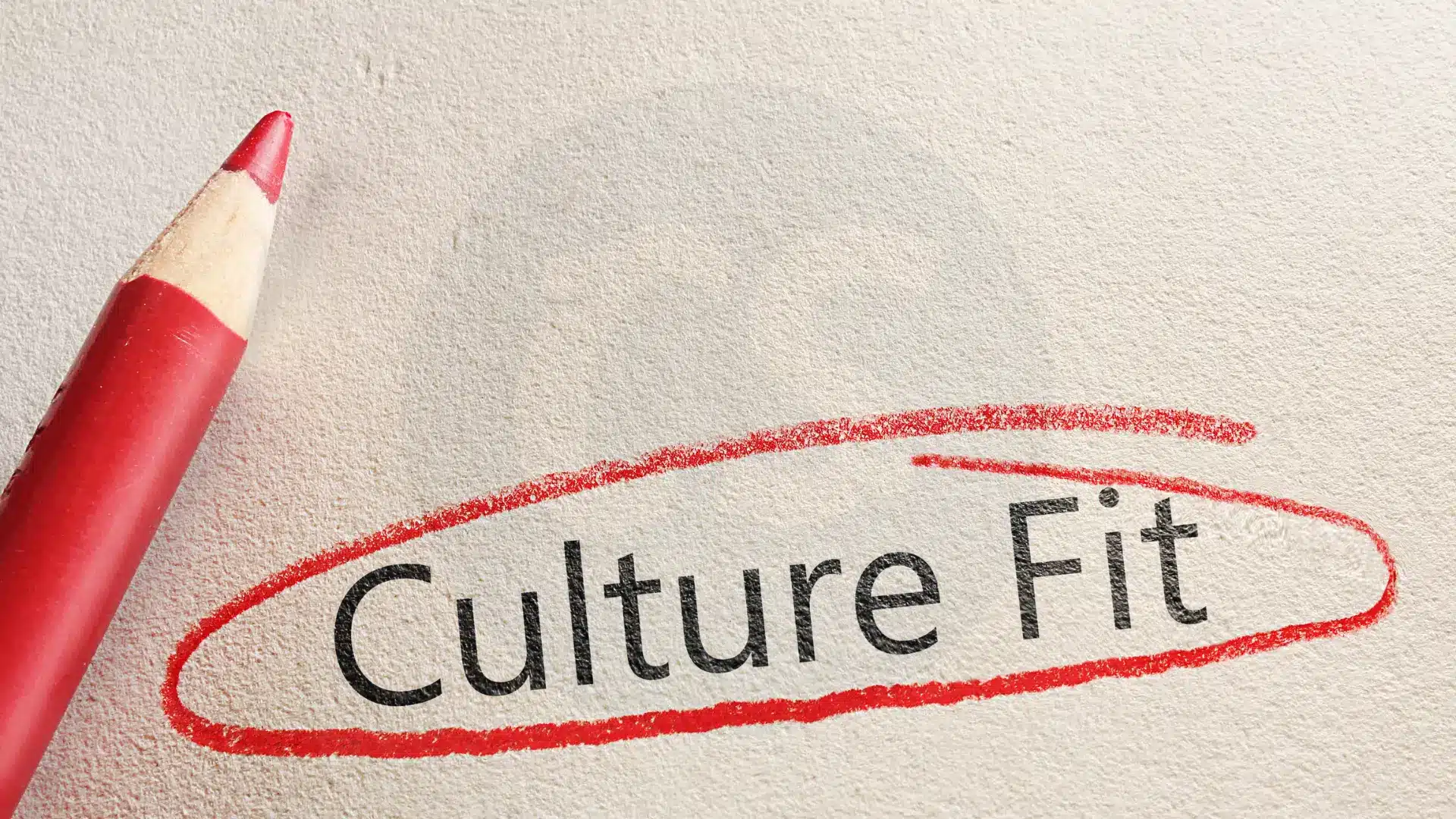 cultural fit written on a paper with a red pencil